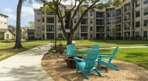 Apartments in Spring An apartment complex in Spring, TX featuring lawn chairs and a fire pit. Savannah Oaks Apartments in Spring 21000 Gosling Road Spring, TX 77388  1-833-883-3616