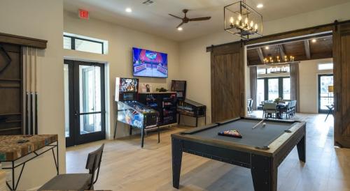 Apartments in Spring, TX - Clubhouse Billiards and Arcade Area