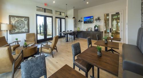 Apartments in Spring, TX - Clubhouse Coffee Lounge with TV