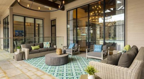 Apartments in Spring, TX - Covered Outdoor Patio Seating Area