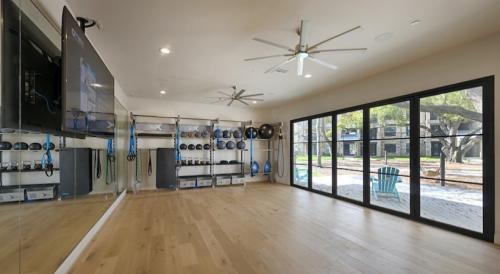 Apartments in Spring, TX - Yoga and Spin Studio with Large Windows 