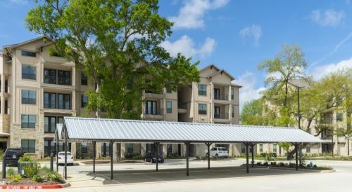 Three Bedroom Apartment Rentals in Spring, TX - Covered Parking Area