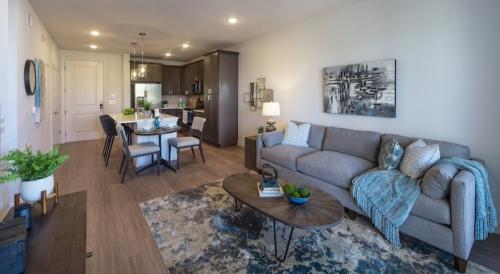 One Bedroom Apartment Rentals in Spring, TX - Model Living Room with View to Kitchen