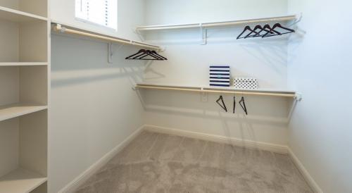 Two Bedroom Apartment Rentals in Spring, TX - Model Spacious Walk-in Closet with Custom Shelving 